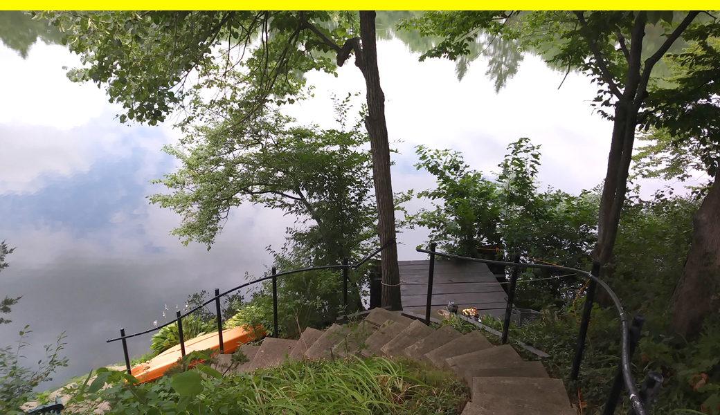 You'd like a deck just above the waterline 25 feet down a steep hill? No problem!